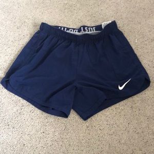 Navy Nike dri-fit running shorts